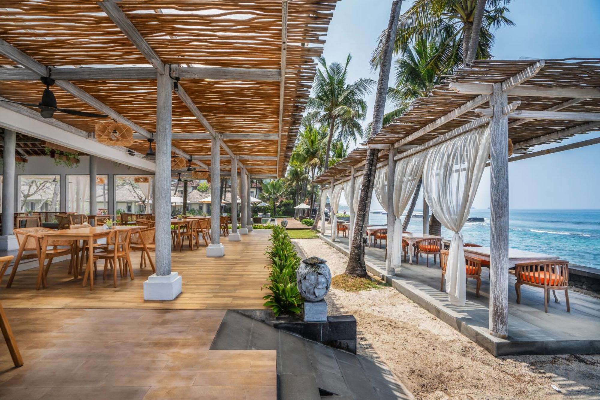 ニルワナ ビーチ アンド リゾート チャンディダサ エクステリア 写真 The Beach Club