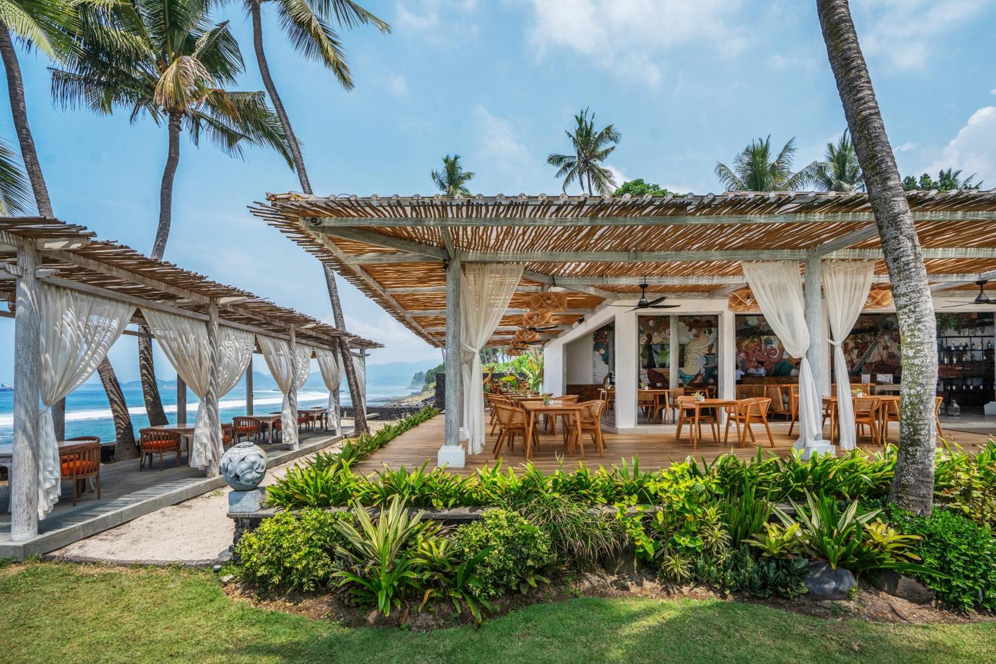 ニルワナ ビーチ アンド リゾート チャンディダサ エクステリア 写真 The Beach Club