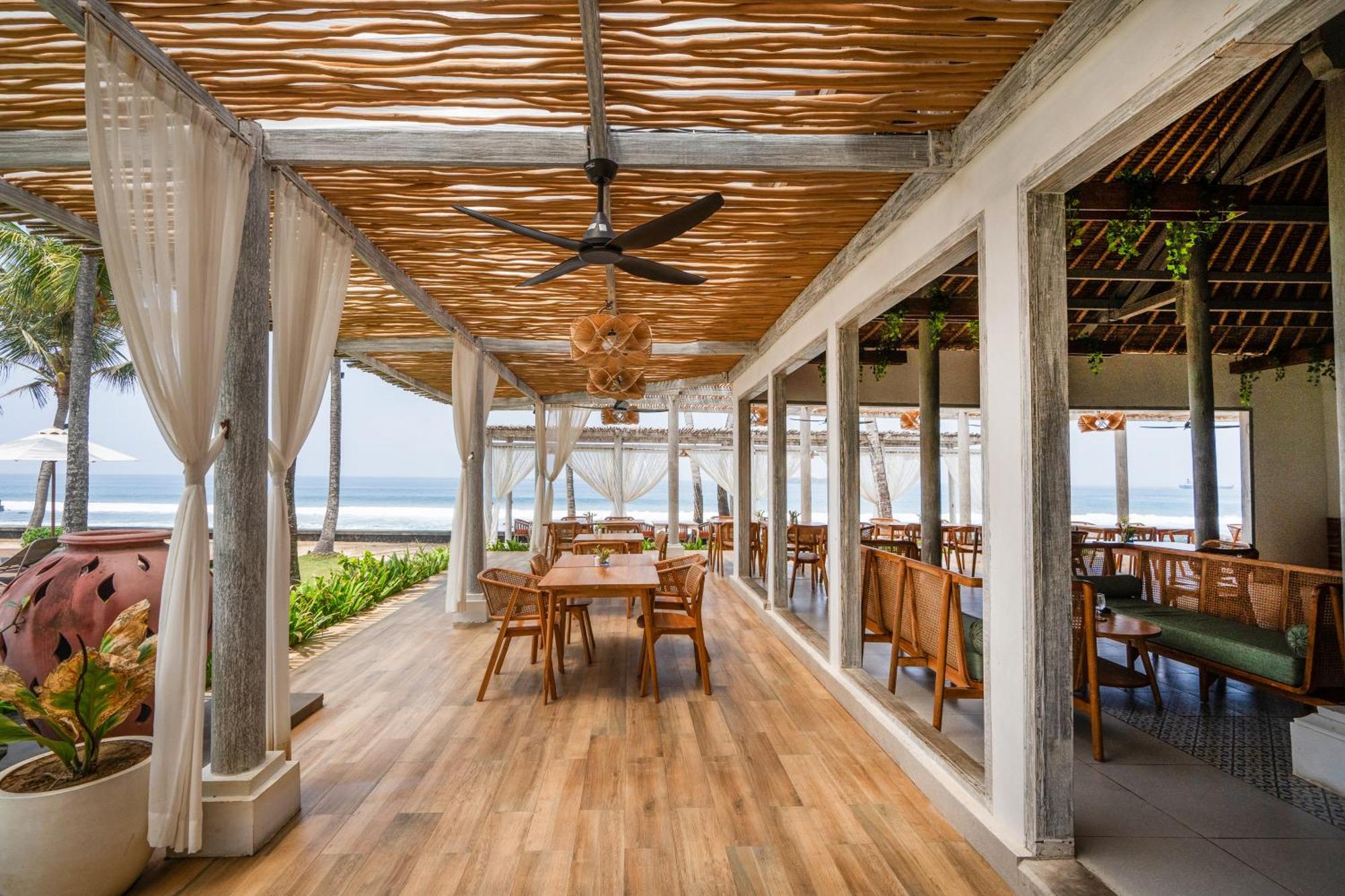 ニルワナ ビーチ アンド リゾート チャンディダサ エクステリア 写真 The Beach Club
