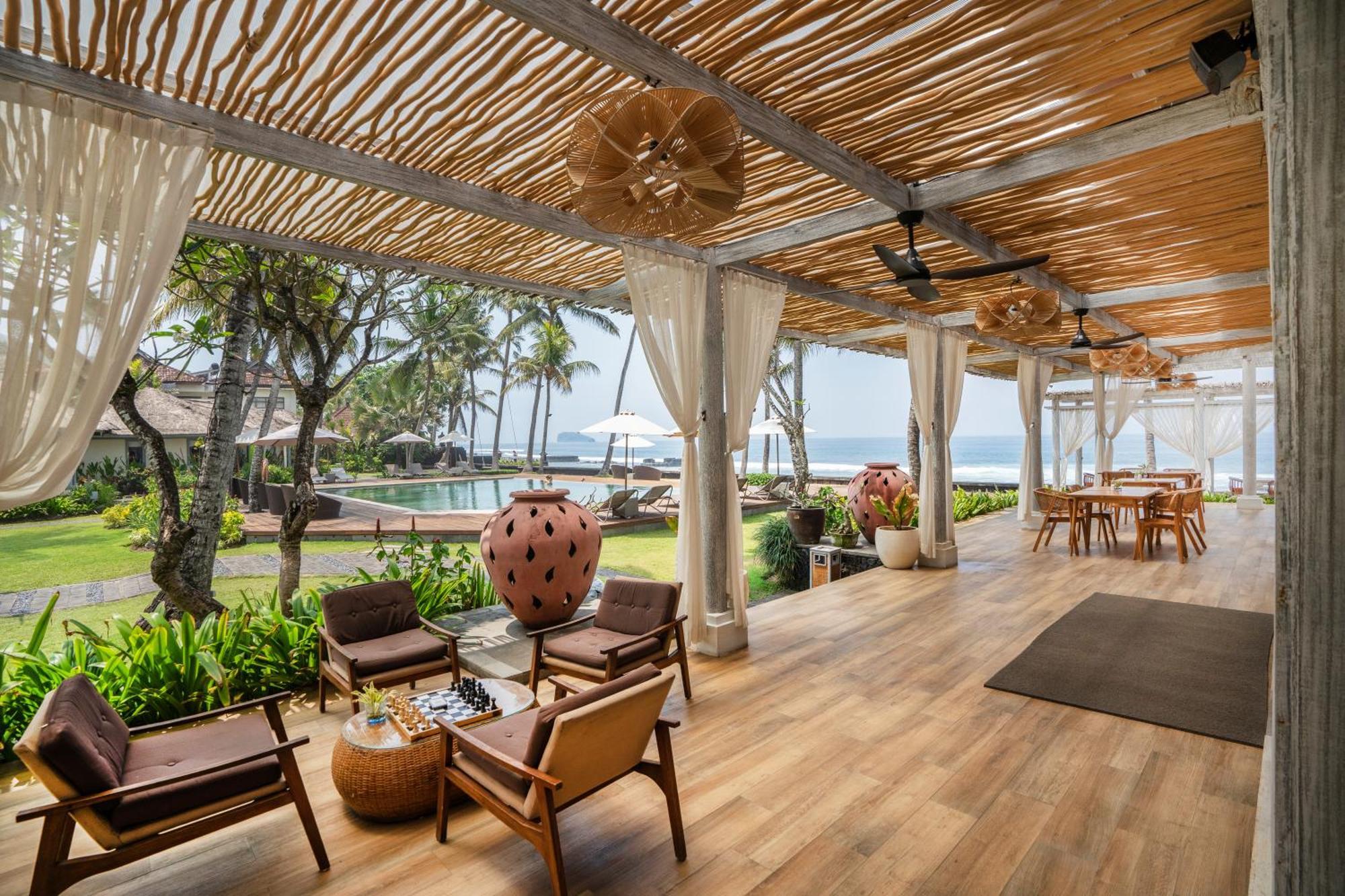 ニルワナ ビーチ アンド リゾート チャンディダサ エクステリア 写真 The Beach Club